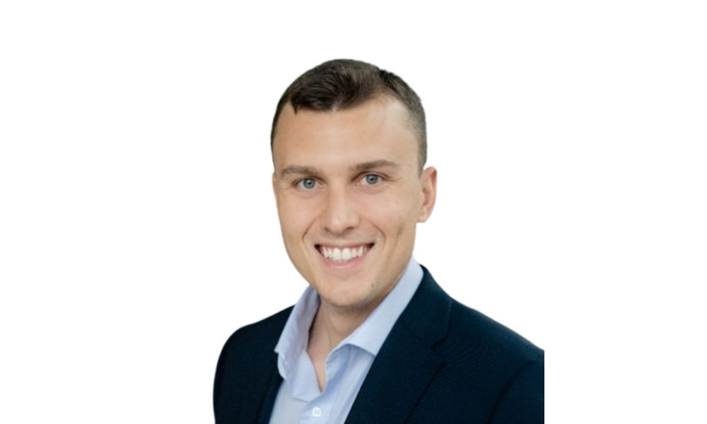 Carl Axel Holtsmark, Gallagher Re’ye Katıldı